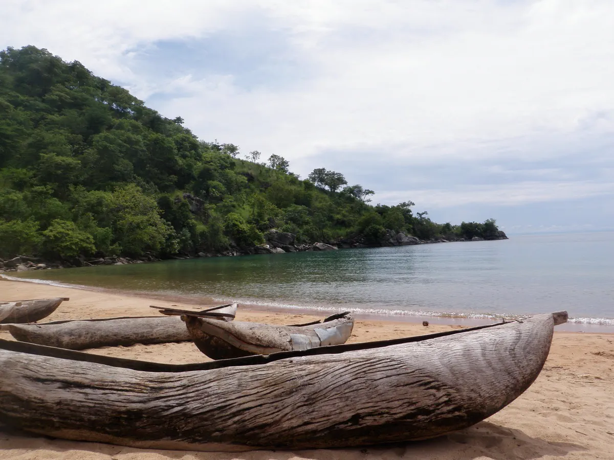 Dugout canoes on the beach at Cape Maclear, Lake Malawi