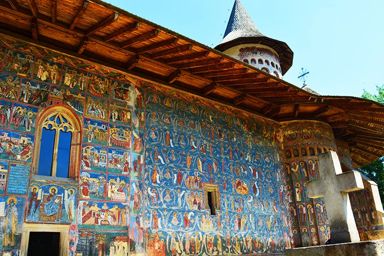 Painted outer walls of Voronet Monastery in Bucovina, Romania