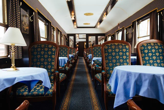 Elegant dining carriage aboard a luxury rail journey